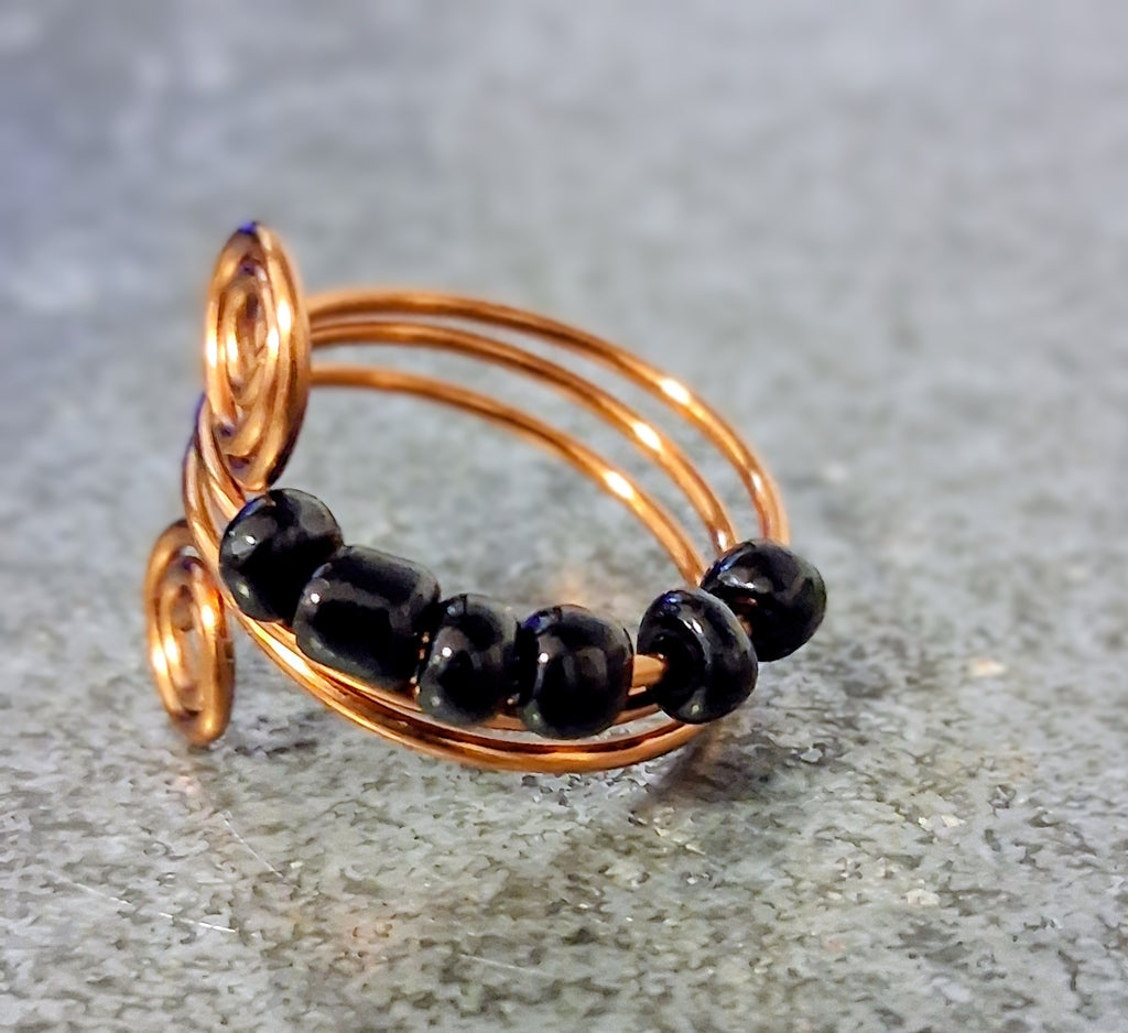 Copper Spiral Fidget Ring – Handmade Adjustable Anxiety Ring with Black Beads